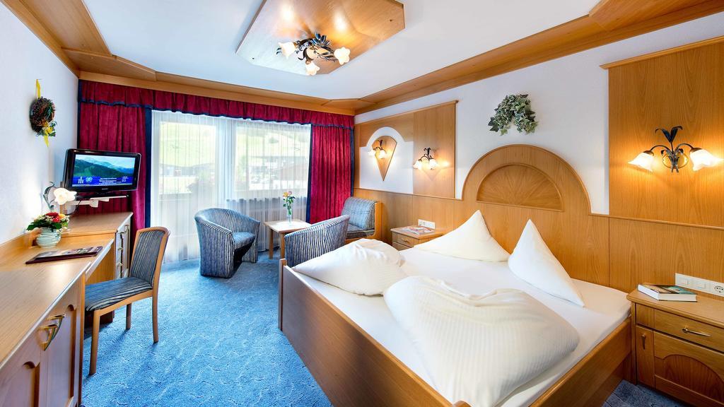 Hotel Bergland Lermoos Quarto foto